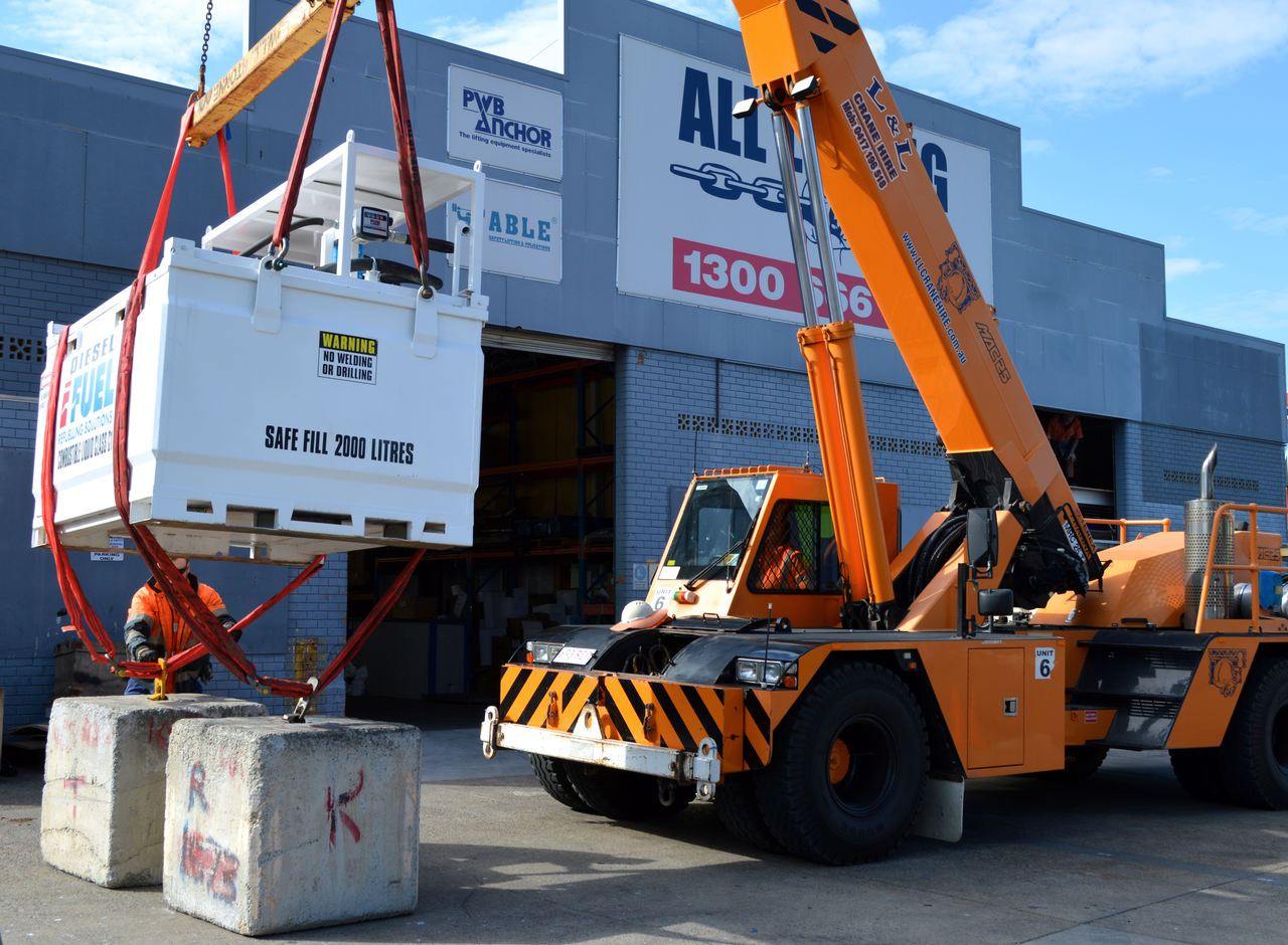 Mobile crane lifting a load - All Lifting